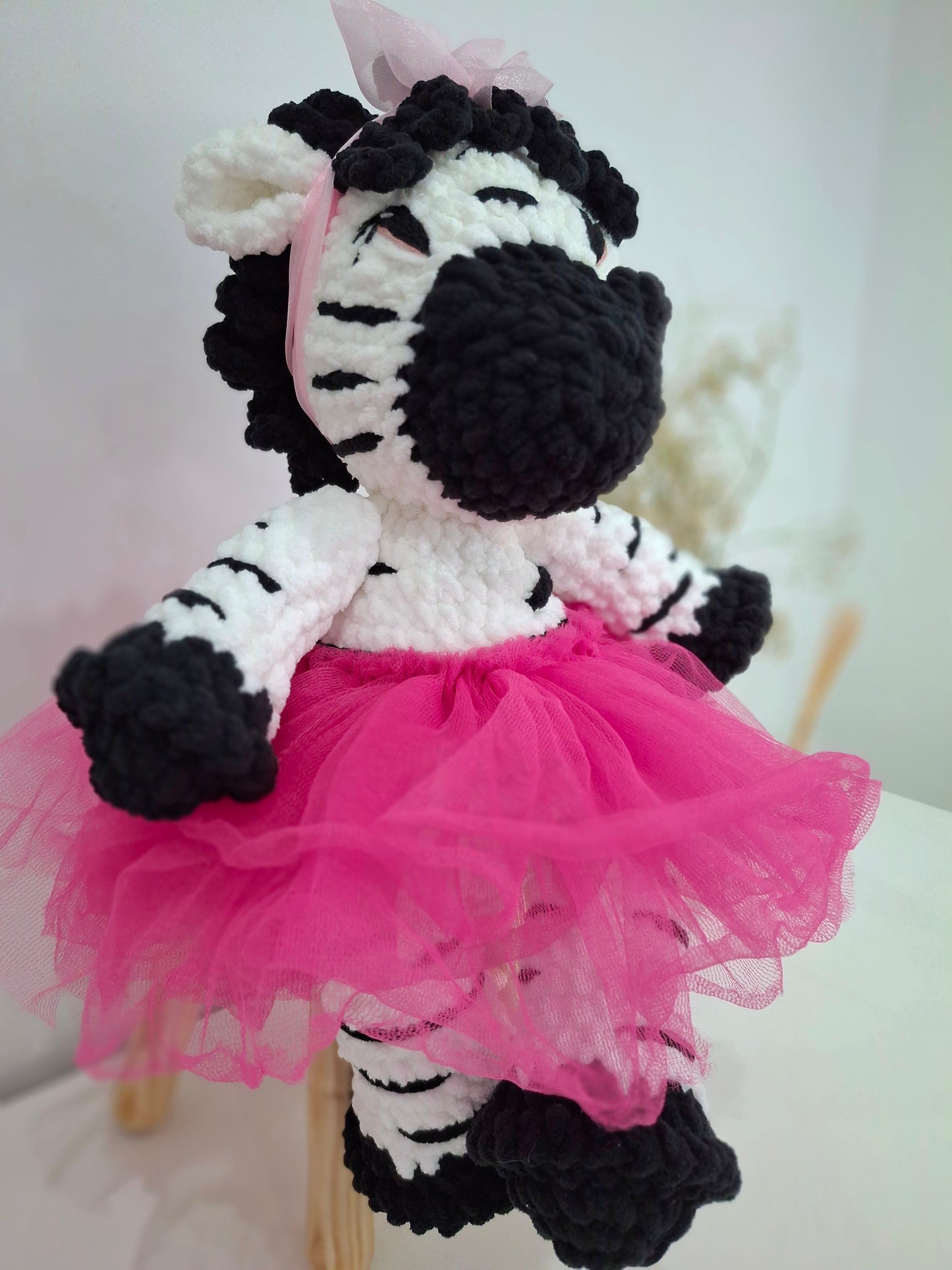 Thanda Zibby, crochet toy zebra, sitting