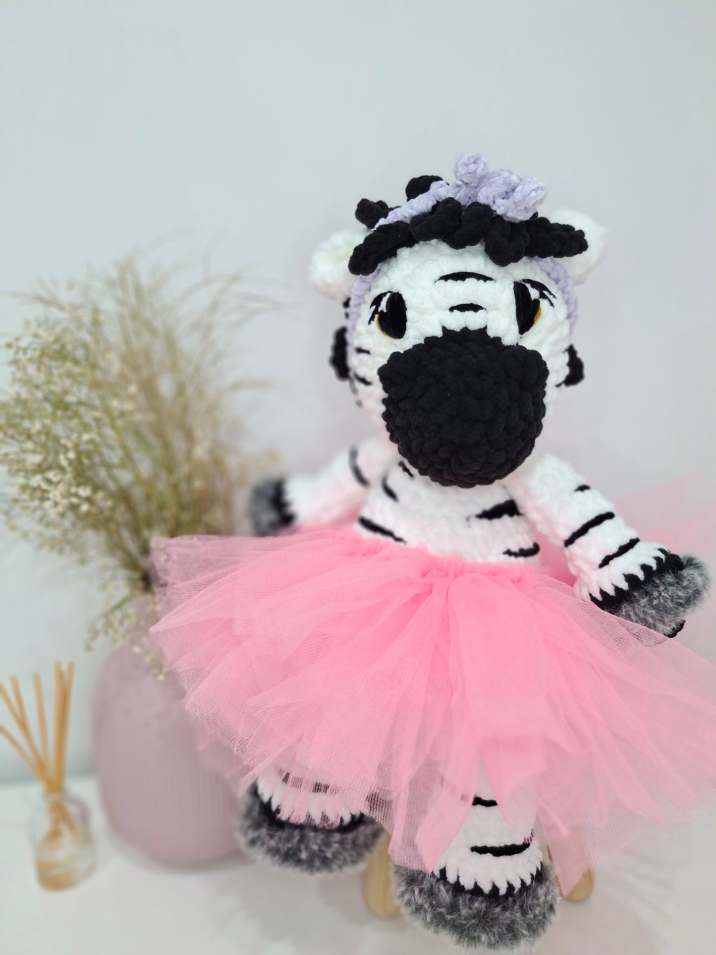 Thabi Zibby, crochet toy zebra, sitting